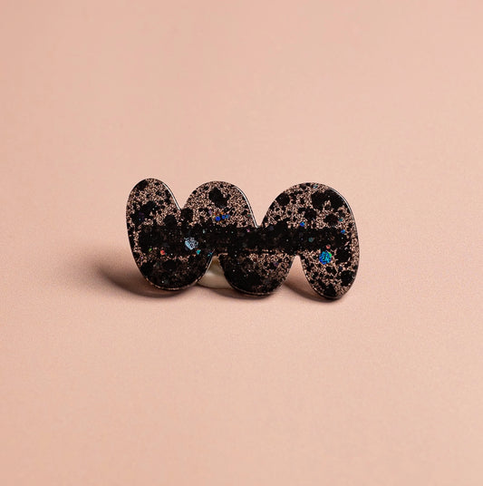 barrette boucle noir pailleté pour cheveux